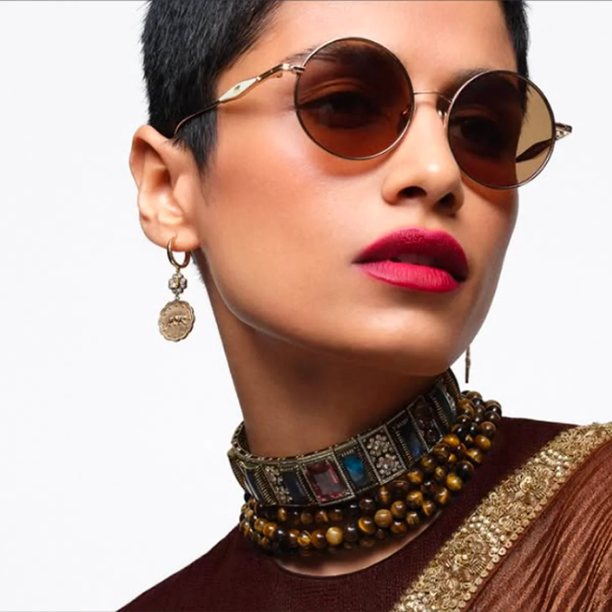 Sabyasachi® sunglasses and jewellery portrait